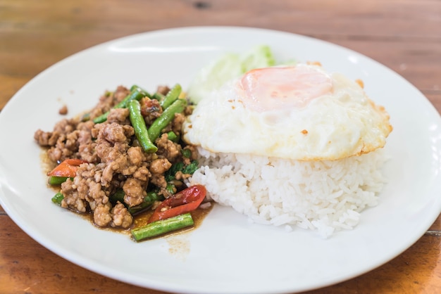 Rice topped with stir fried minced pork and basil