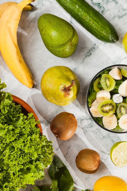 Ripe fruit and vegetables on marble table