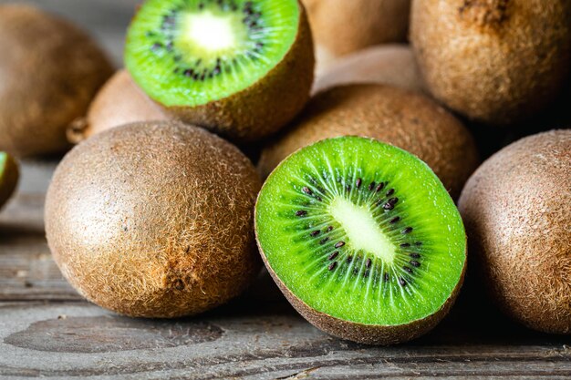 Ripe fruits of kiwi cut and whole close up