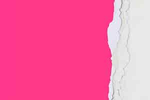 Free photo ripped paper border in pink on handmade colorful background