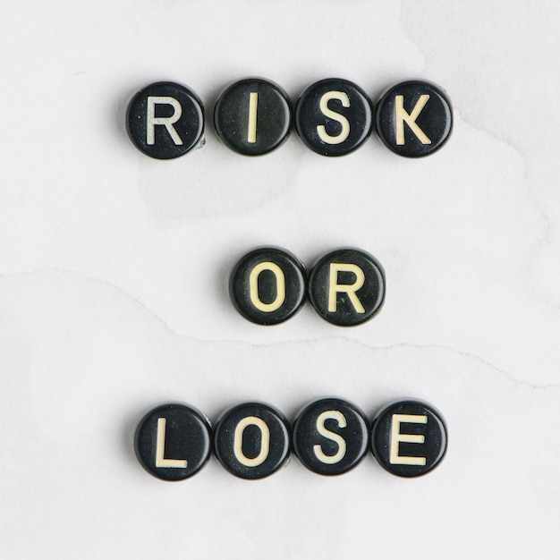 Free photo risk or lose beads message typography