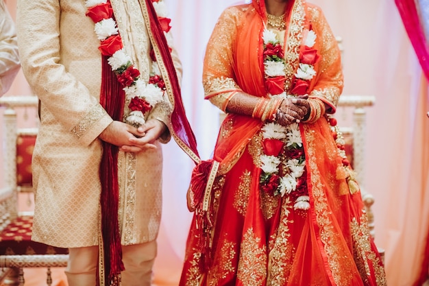 Ritual with coconut leaves during traditional Hindu wedding ceremony