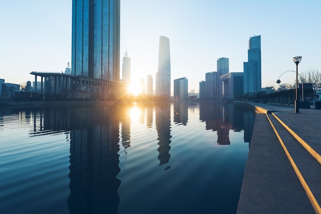 River And Modern Buildings Against Sky