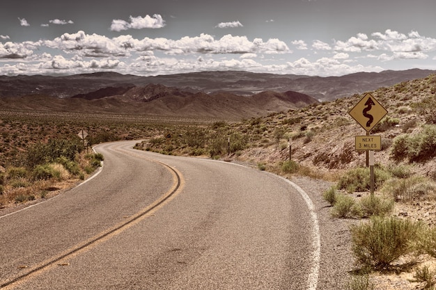 Road on desert during daytime