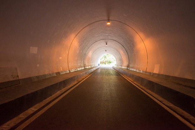 Free photo road tunnel, night illuminated