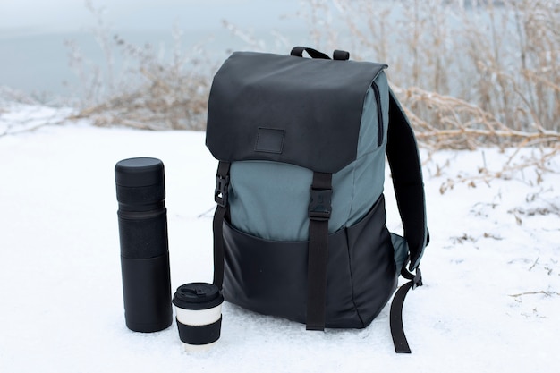 Free Photo roadtrip concept with backpack and flask