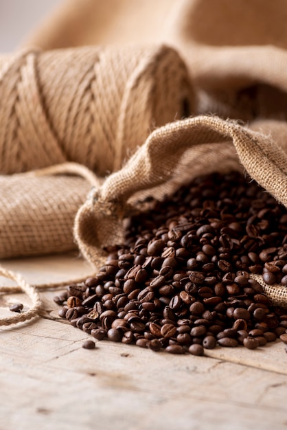 Roasted coffee beans in a burlap sack