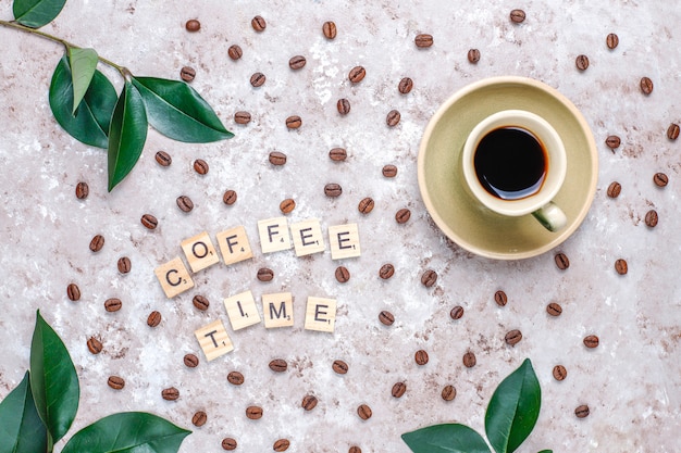 Free photo roasted coffee beans and coffee bean shaped cookies