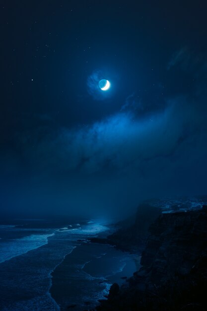 Rocky shore under full moon