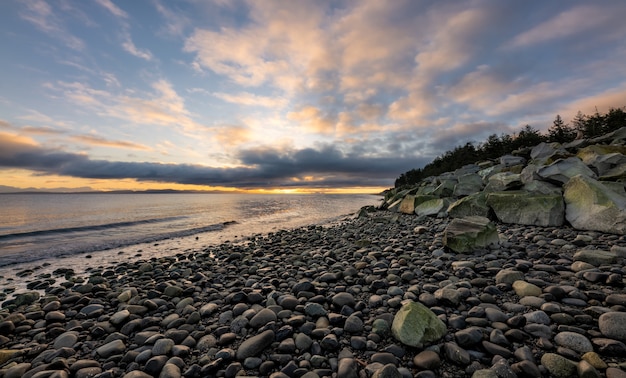 Free Photo rocky shore during sunset