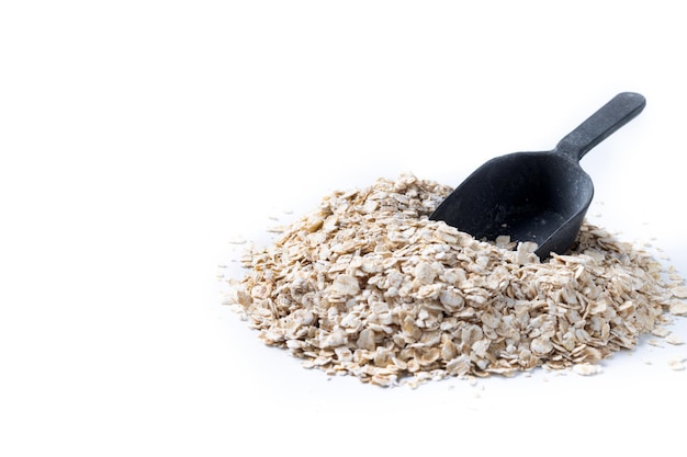 Rolled oats healthy breakfast cereal oat flakes isolated on white background