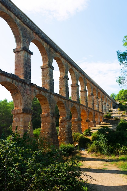 Roman aqueduct de les Ferreres in sunny day