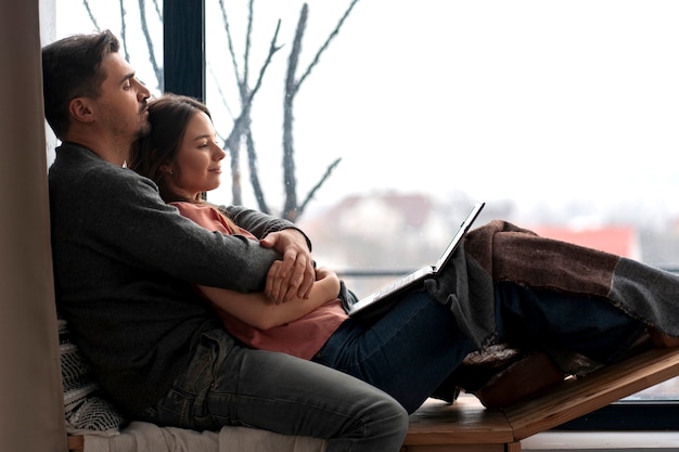 Free photo romantic couple celebrating valentine's day together at home