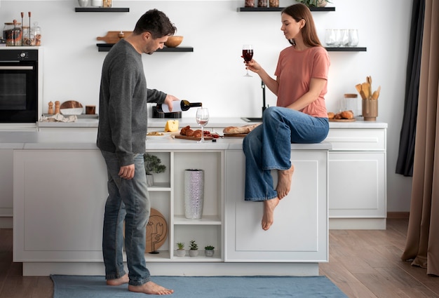 Free Photo romantic couple celebrating valentine's day together at home