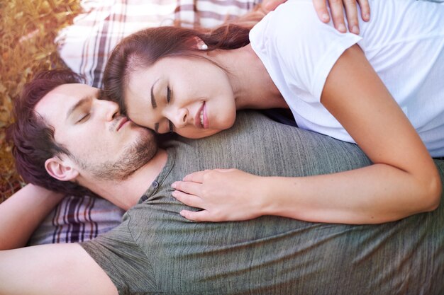 Romantic couple enjoying a picnic in the park