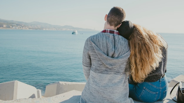 Romantic couple in front of sea