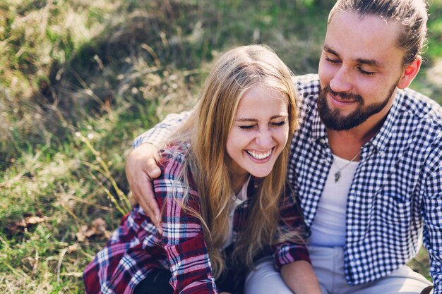 Romantic couple has beautiful moments of happiness and joy summer park.