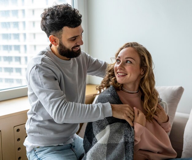 Romantic couple resting at home