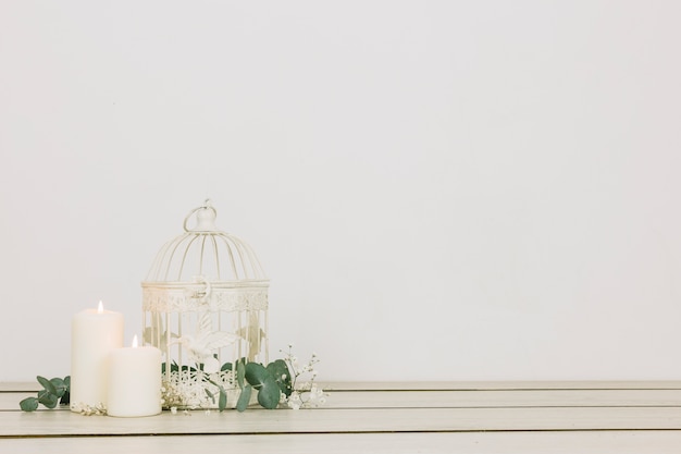 Romantic ornaments with candles and cage