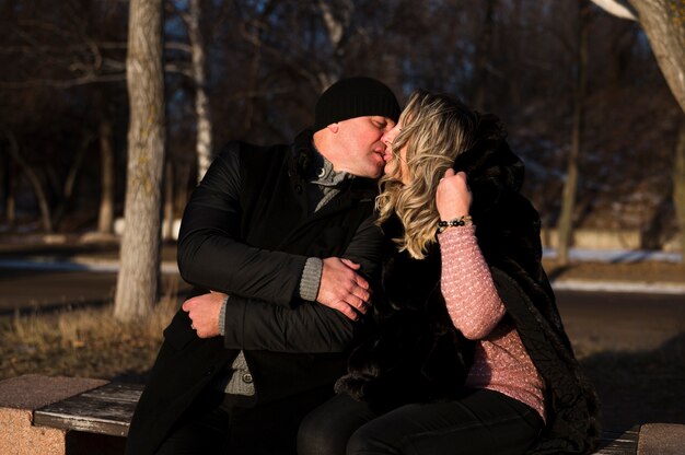 Romantic senior couple kissing each other