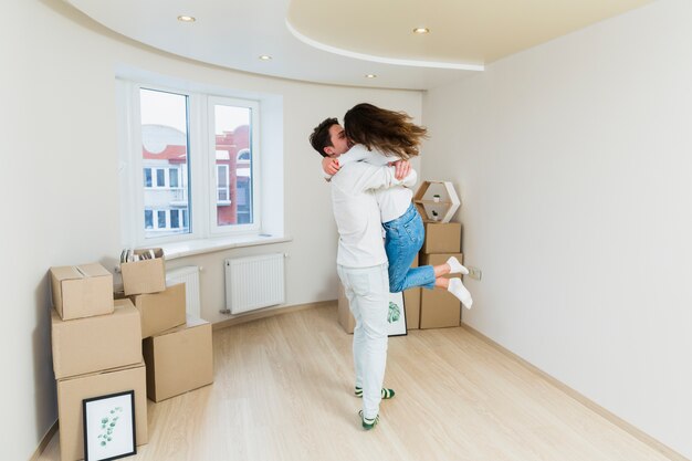 Romantic young couple in their new apartment