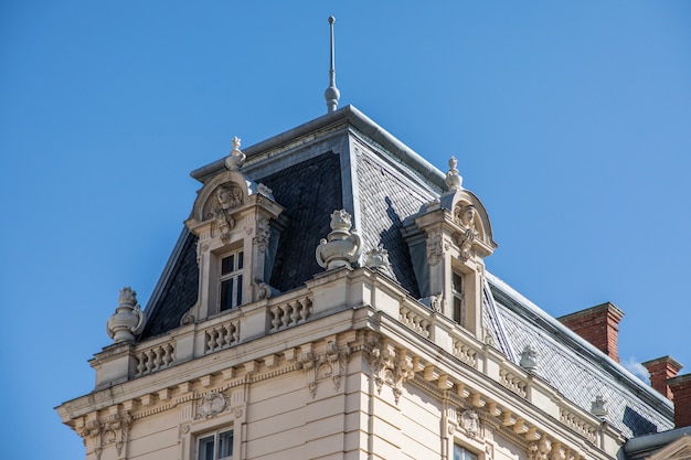 Free Photo roof of old building in front of blue sky in day time