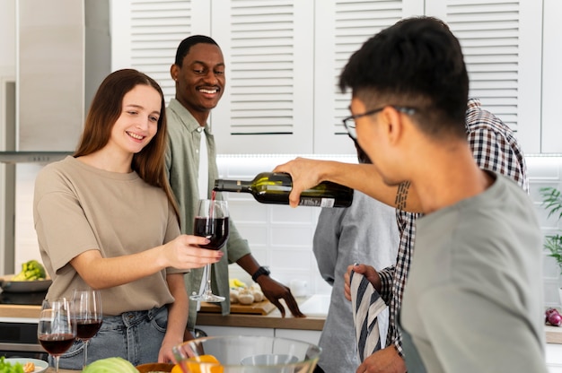 Roommates drinking wine medium shot