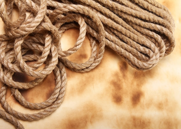 Free Photo rope on the old paper background