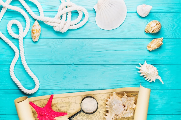 Free photo rope and seashells near map