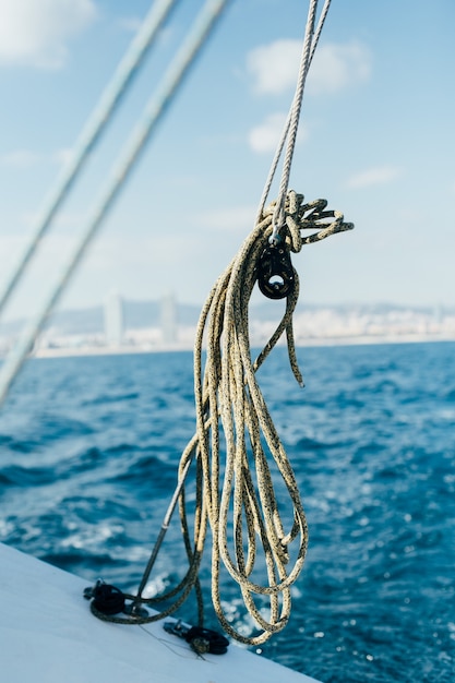 Ropes on deck of professional sailing yacht