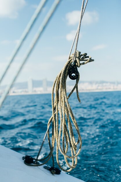 Ropes on deck of professional sailing yacht