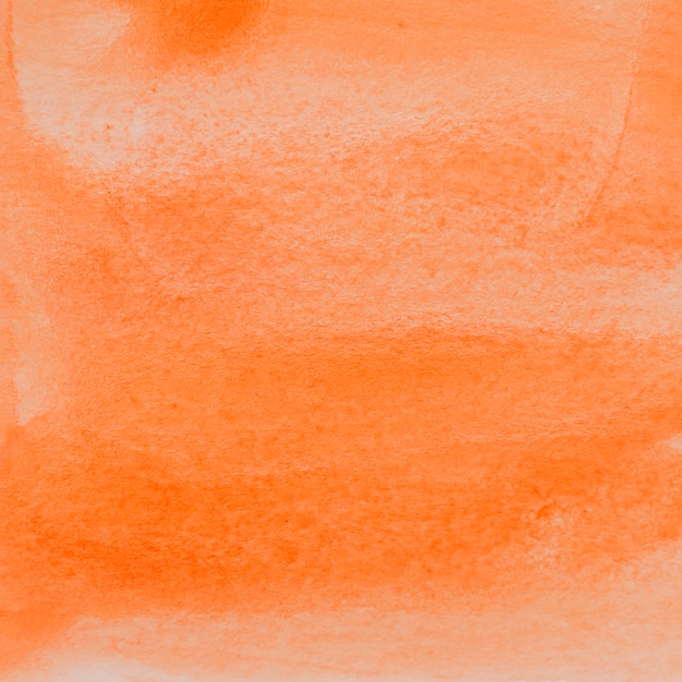 Free photo rough painted orange water color backdrop