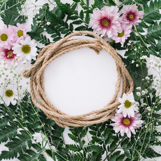 Free photo round floral composition with rope