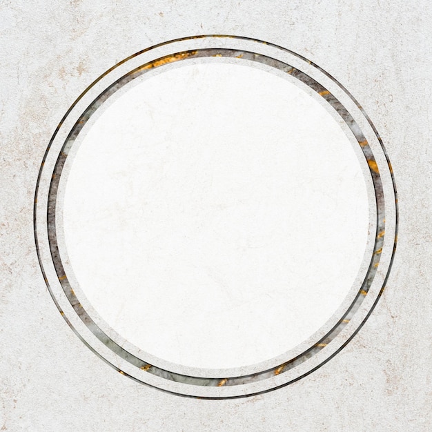 Free photo round frame on white marble textured background