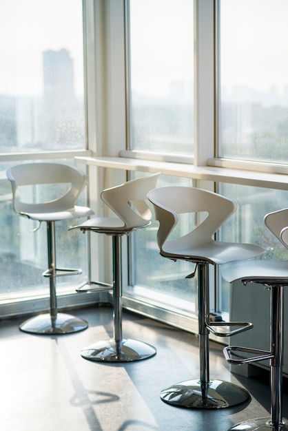 Free photo row of empty chairs in office