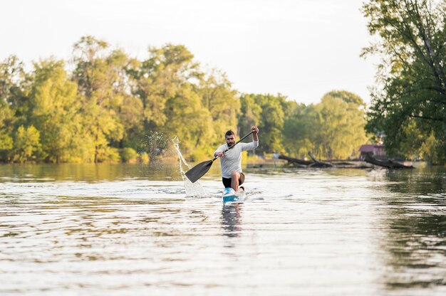 Rowing concept with man outdoors