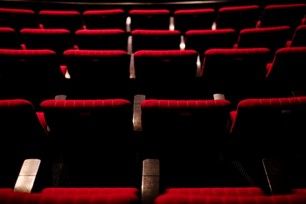 Free photo rows of red seats in a theater