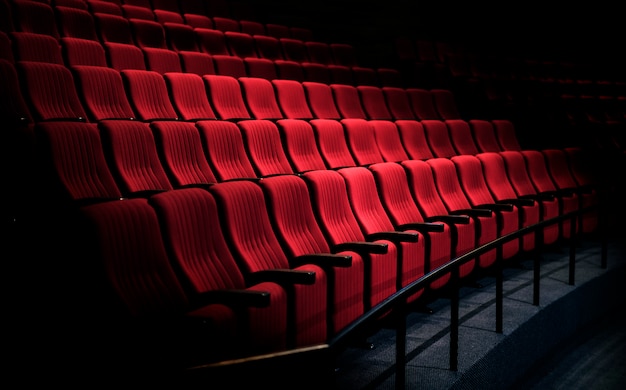 Free photo rows of red seats in a theater