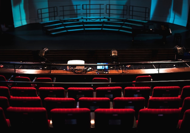 Rows of red seats in a theater