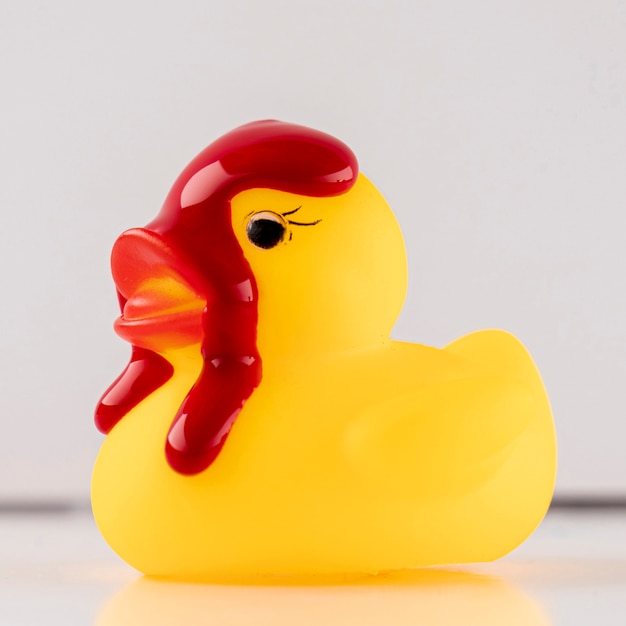 Free Photo rubber duck with dripping red paint