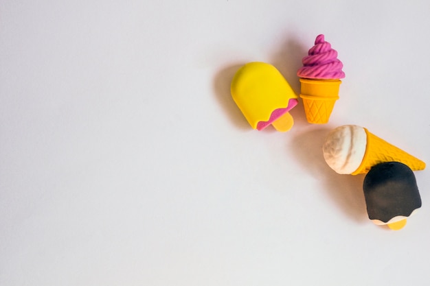 Free photo rubbers in shape of ice-cream