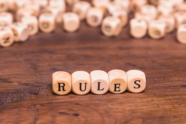 Free photo rule word written on wooden cubes