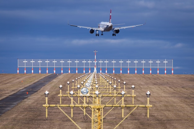 Free Photo runway lights with landing airbus in vienna