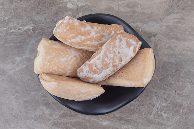 Russian cookies in a small bowl on marble 