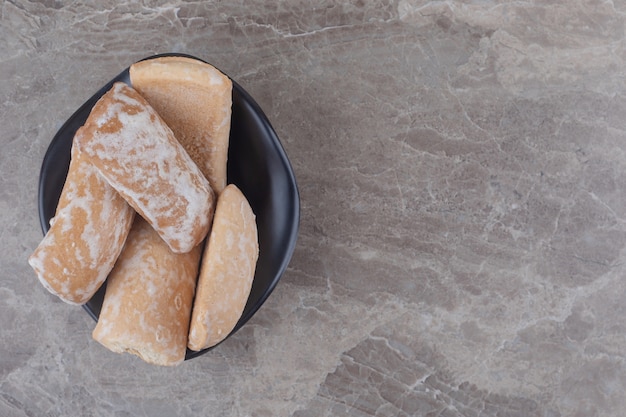 Russian cookies in a small bowl on marble 