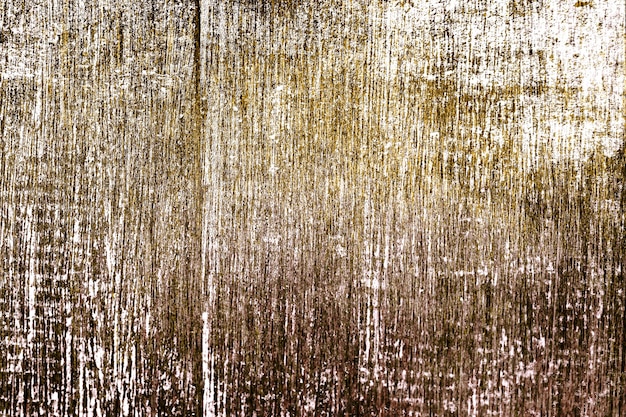 Rustic gold paint textured background