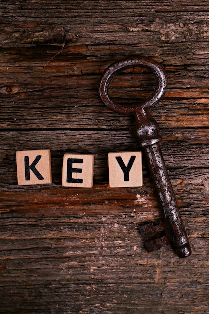 Rustic keys on wooden table 