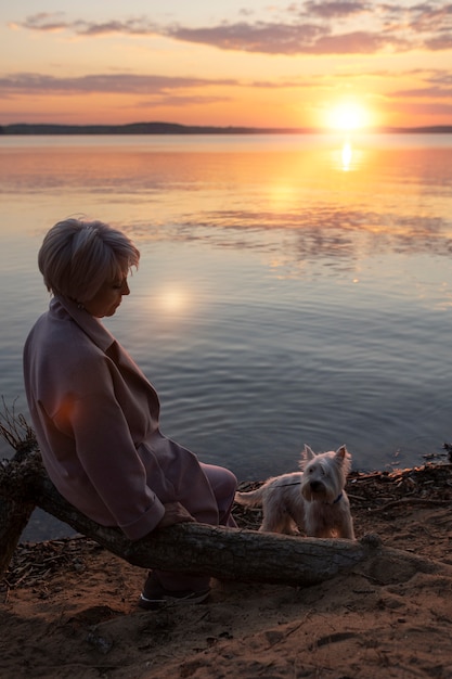 Free Photo sad and contemplative person near lake