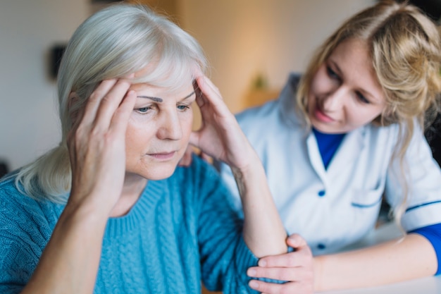 Sad woman in nursing home