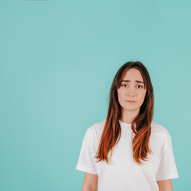 Sad woman in white T-shirt